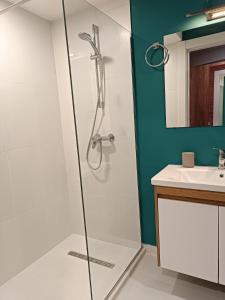 a bathroom with a shower and a sink at Apartment with a great view 544 in Gudauri