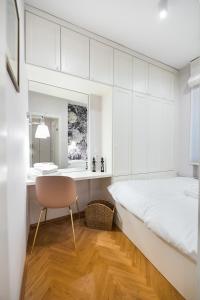 Posteľ alebo postele v izbe v ubytovaní MOSTOWA Abdank Old Town Apartment