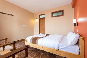 Postel nebo postele na pokoji v ubytování Khangsar Home + 37 fotografií