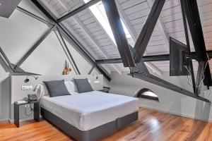 Postel nebo postele na pokoji v ubytování Hotel Parada Puigcerda + 40 fotografií