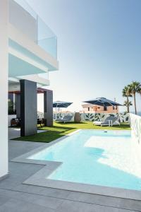 an image of a swimming pool in a house at Villa Macaronesia in Adeje