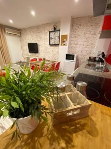 Kuchyňa alebo kuchynka v ubytovaní Apartamentos Sevilla Palace