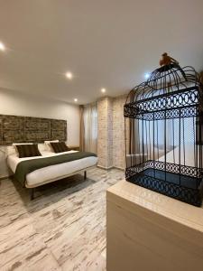 Posteľ alebo postele v izbe v ubytovaní Apartamentos Sevilla Palace