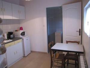 Kuchyňa alebo kuchynka v ubytovaní Gîte du figuier
