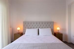 A bed or beds in a room at A Truly WOW Experience for Every Guest. THE place