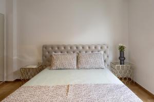 A bed or beds in a room at A Truly WOW Experience for Every Guest. THE place