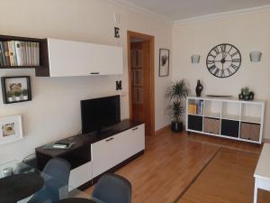 TV in/ali zabaviščno središče v nastanitvi Apartamento Luferlo