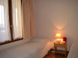 Кровать или кровати в номере Appartement Saint-Cyprien, 2 pièces, 4 personnes - FR-1-225D-169