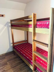 a bunk bed room with two bunk beds at VVF Résidence Albiez-Montrond Maurienne in Albiez-Montrond