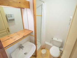 a small bathroom with a toilet and a sink at Appartement Valmorel, 3 pièces, 7 personnes - FR-1-291-708 in Valmorel