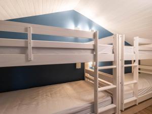 a bunk bed with two bunk beds in a room at Appartement Valmorel, 3 pièces, 7 personnes - FR-1-291-743 in Valmorel