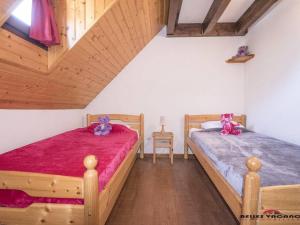 Кровать или кровати в номере Appartement Saint-Lary-Soulan, 3 pièces, 6 personnes - FR-1-296-215