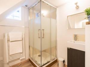 a bathroom with a glass shower and a sink at Chalet Valmorel, 7 pièces, 15 personnes - FR-1-291-793 in Valmorel