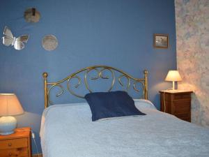 En eller flere senge i et værelse på Maison Saint-Cyprien, 4 pièces, 7 personnes - FR-1-225D-421