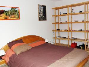 Кровать или кровати в номере Appartement Briançon, 3 pièces, 6 personnes - FR-1-330C-72