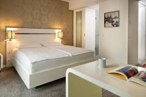 Postel nebo postele na pokoji v ubytování INNSiDE by Meliá Dresden