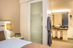 Postel nebo postele na pokoji v ubytování INNSiDE by Meliá Dresden