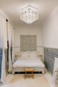 Postel nebo postele na pokoji v ubytování Riad Maison 24