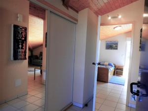 a room with a door leading to a bedroom at Appartement T3 à Vieux-Boucau - 6 pers - Proche océan, lac et plage - Terrasse Ouest - Quartier calme - FR-1-379-28 in Vieux-Boucau-les-Bains