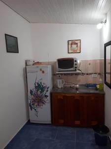 Η κουζίνα ή μικρή κουζίνα στο Cabañas Eterno Vergel
