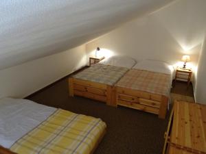 Un ou plusieurs lits dans un hébergement de l'établissement Appartement Bourg-Saint-Maurice, 1 pièce, 5 personnes - FR-1-411-93