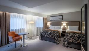 מיטה או מיטות בחדר ב-Clayton Hotel Bristol City