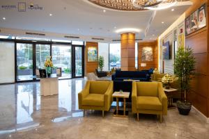 The lobby or reception area at Romera Hotel