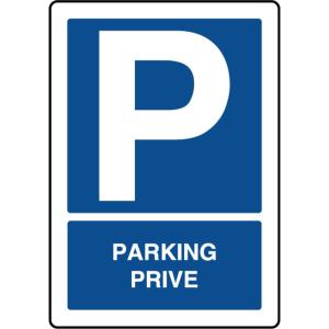 a parking sign with a white p and the words parking private at Le Côté Cour in Barcelonnette