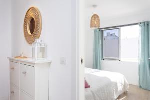 Postel nebo postele na pokoji v ubytování Home2Book Beachfront Design&Views Los Cristianos