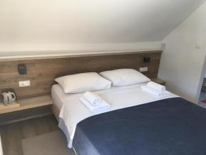 Posteľ alebo postele v izbe v ubytovaní Guesthouse Family Bosnic