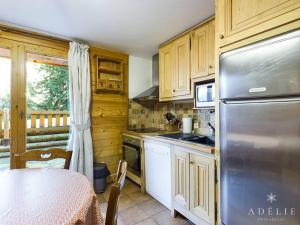 Appartement Montvalezan-La Rosière, 3 pièces, 6 personnes - FR-1-398-523にあるキッチンまたは簡易キッチン