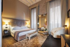 Postel nebo postele na pokoji v ubytování DOM Hotel Roma - Preferred Hotels & Resorts
