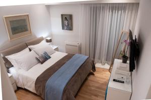Posteľ alebo postele v izbe v ubytovaní Katia Modern Apartment in Athens