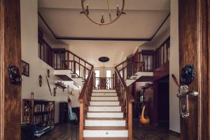 a staircase in a house with wooden treads at Kilihouse Bb Large Ensuite Double Bedroom with full facilities in Thika +10 photos