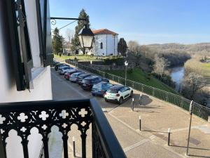 a view from a balcony of a parking lot with cars at Appartement Cambo-les-Bains, 2 pièces, 3 personnes - FR-1-495-79 in Cambo-les-Bains