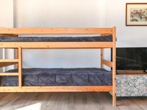 a couple of bunk beds in a room at Studio Montgenèvre, 1 pièce, 4 personnes - FR-1-266-159 in Montgenèvre