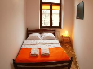 Posteľ alebo postele v izbe v ubytovaní VisitKrak