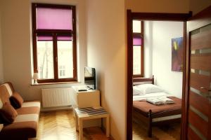 Posteľ alebo postele v izbe v ubytovaní VisitKrak