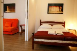 Posteľ alebo postele v izbe v ubytovaní VisitKrak