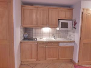 Kuhinja ili čajna kuhinja u objektu Appartement Méribel, 3 pièces, 4 personnes - FR-1-411-677