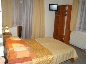 Krevet ili kreveti u jedinici u objektu Willa Stenia Apartamenty