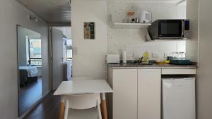 Kuchyň nebo kuchyňský kout v ubytování Tu lugar en Buenos Aires 2 ambientes