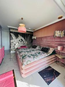 Posteľ alebo postele v izbe v ubytovaní Tropical Villa