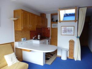 a small kitchen with a sink and a counter at Studio Arette, 1 pièce, 5 personnes - FR-1-602-43 in Arette