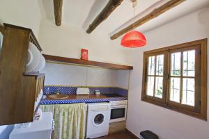 Kuchnia lub aneks kuchenny w obiekcie Villa La Clavelina Rocabella
