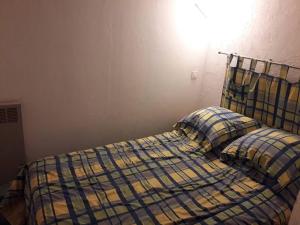 Säng eller sängar i ett rum på Appartement Arette, 1 pièce, 6 personnes - FR-1-602-88