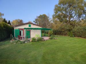 Ein Garten an der Unterkunft Chata nad Wisłą u Macieja
