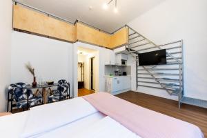 Kuchyňa alebo kuchynka v ubytovaní Adagio Downtown Rooms