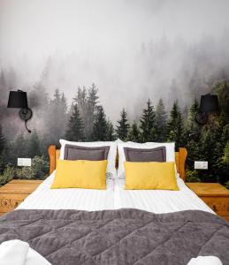 Łóżko lub łóżka w pokoju w obiekcie Willa Roztoka - blisko do wyciągów i term