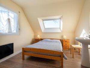 En eller flere senge i et værelse på Villa Carnac, 5 pièces, 8 personnes - FR-1-477-50